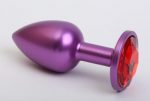 Фиолетовая анальная пробка с красным стразом - 7,6 см.